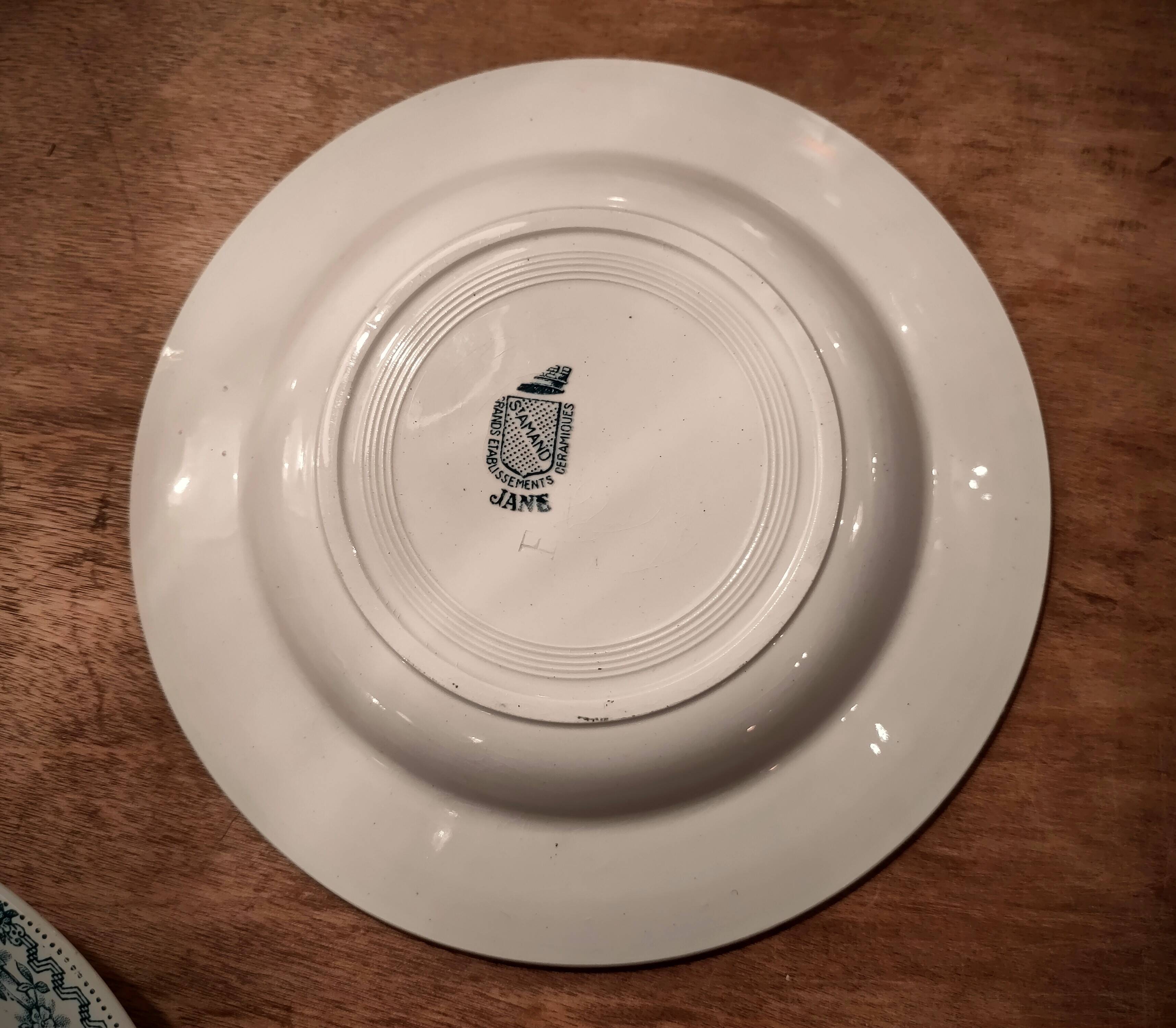 Four Saint Amand plates