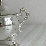 Antique shiny metal sugar bowl