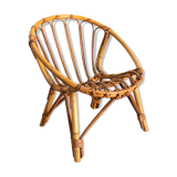 Child chair in rattan shell shape