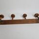 Old wall-mounted portmanteau, 4 patères, in turned wood, 52 cm
