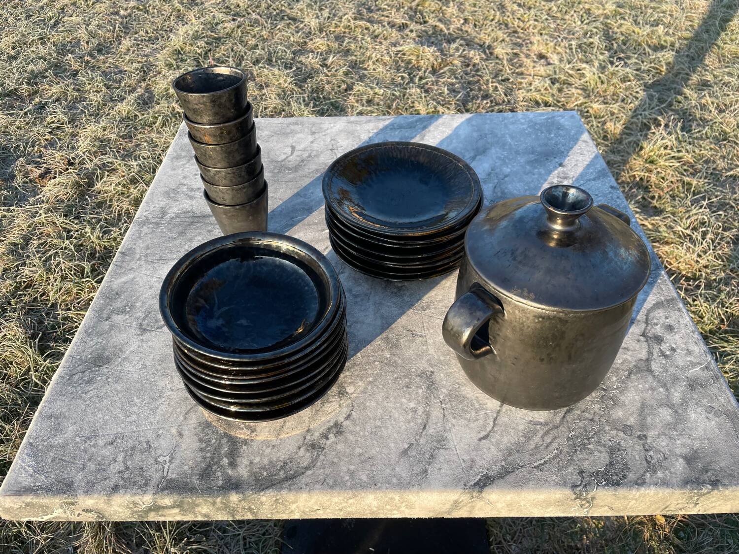 Vallauris service, the pottery of the great oak. Black metal glazed ceramics.
