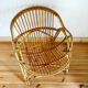 Shell armchair of the 50s in rattan