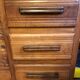 Art deco line-up in 1940s solid oak