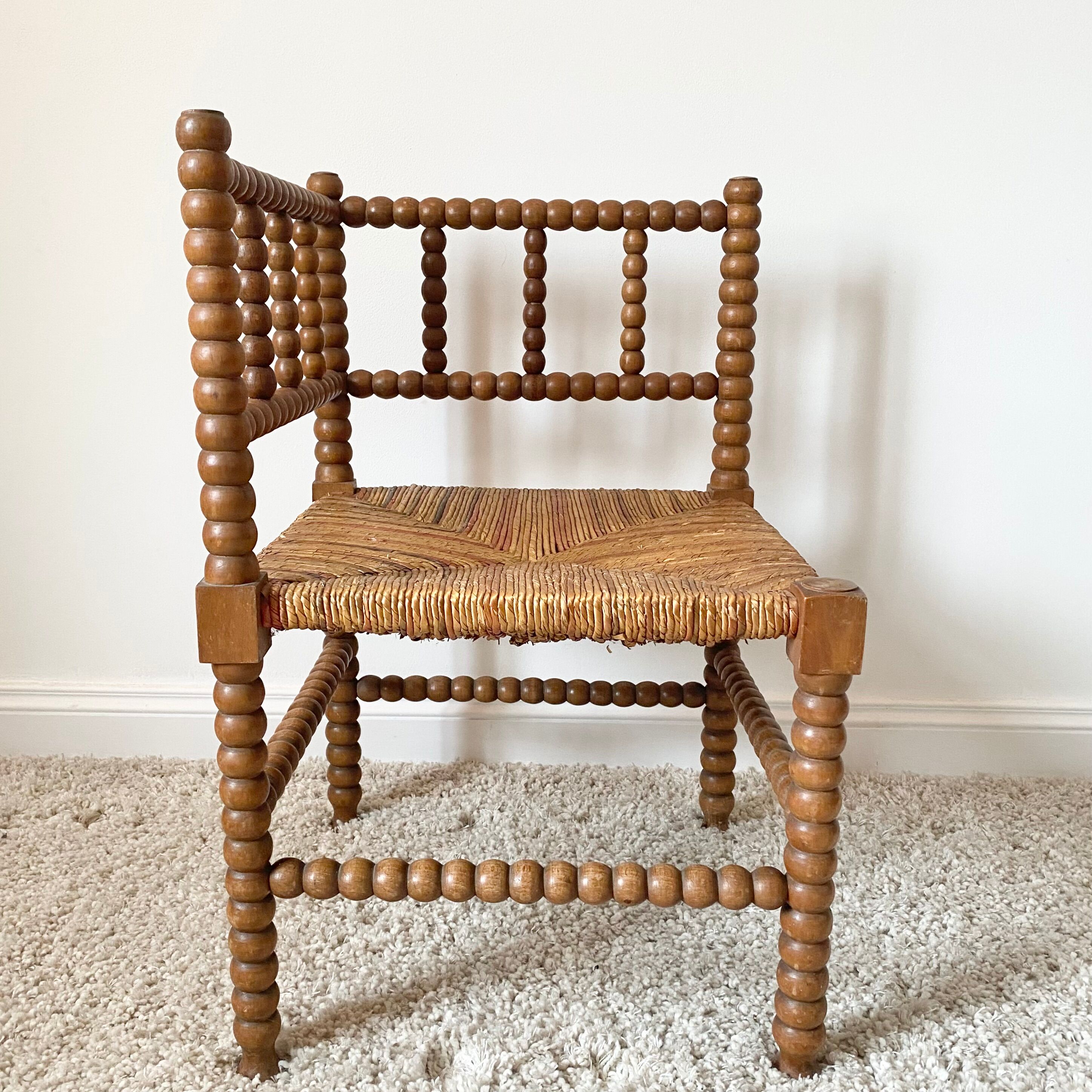 Vintage corner chair in turned oak and straw