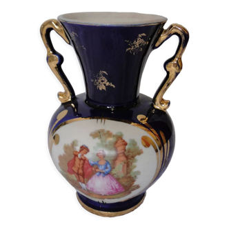 Revol porcelain vase, showcase object, romantic decor, blue background, golden handles