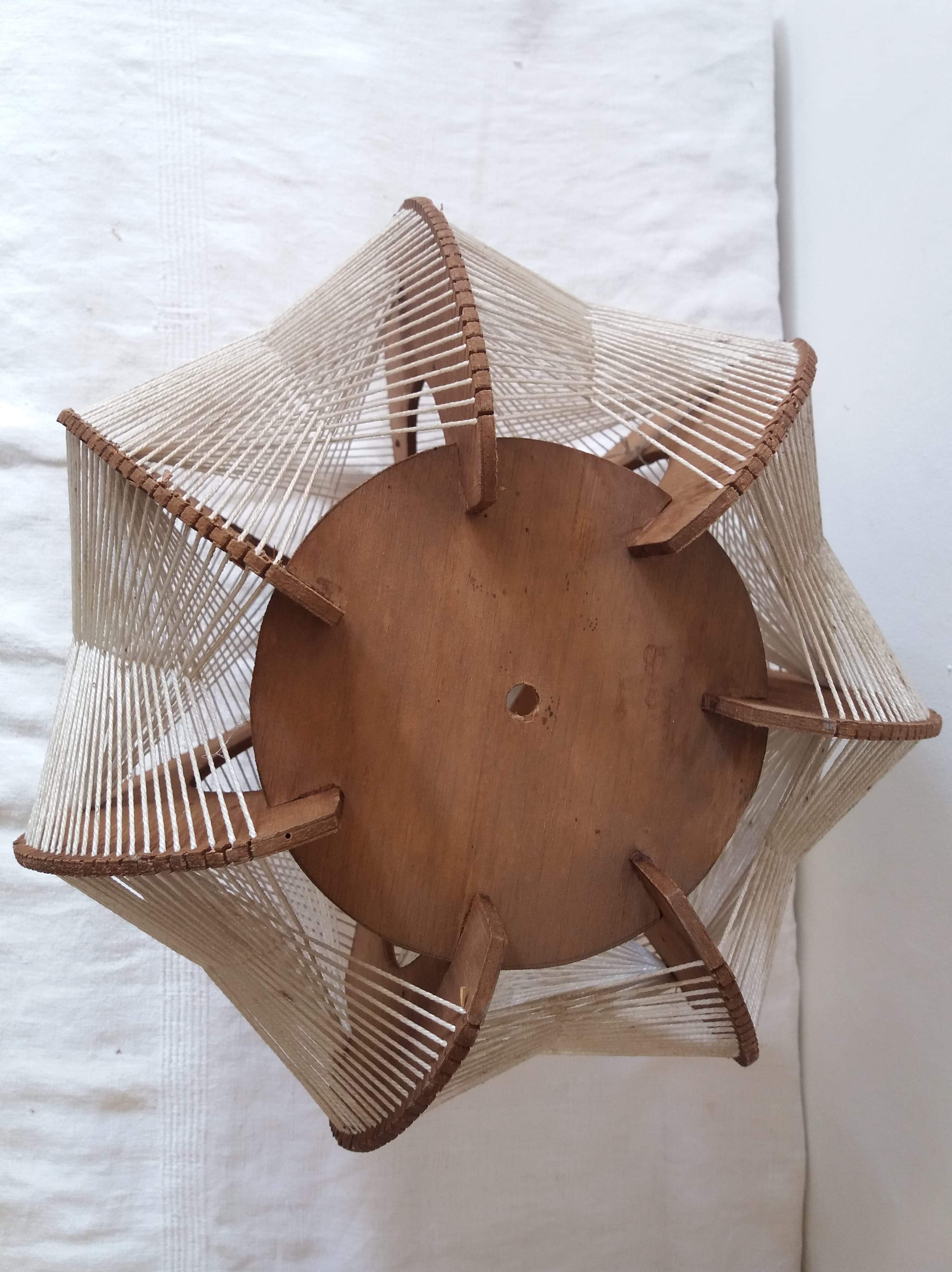 Scandinavian hanging lamp in wood and stretched wires