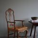 Vintage sculptural armchair in oak and leather, modern Danish style, 1940s.