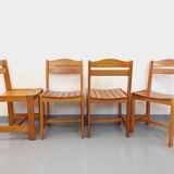 Set of 4 vintage pine chairs from the 70s