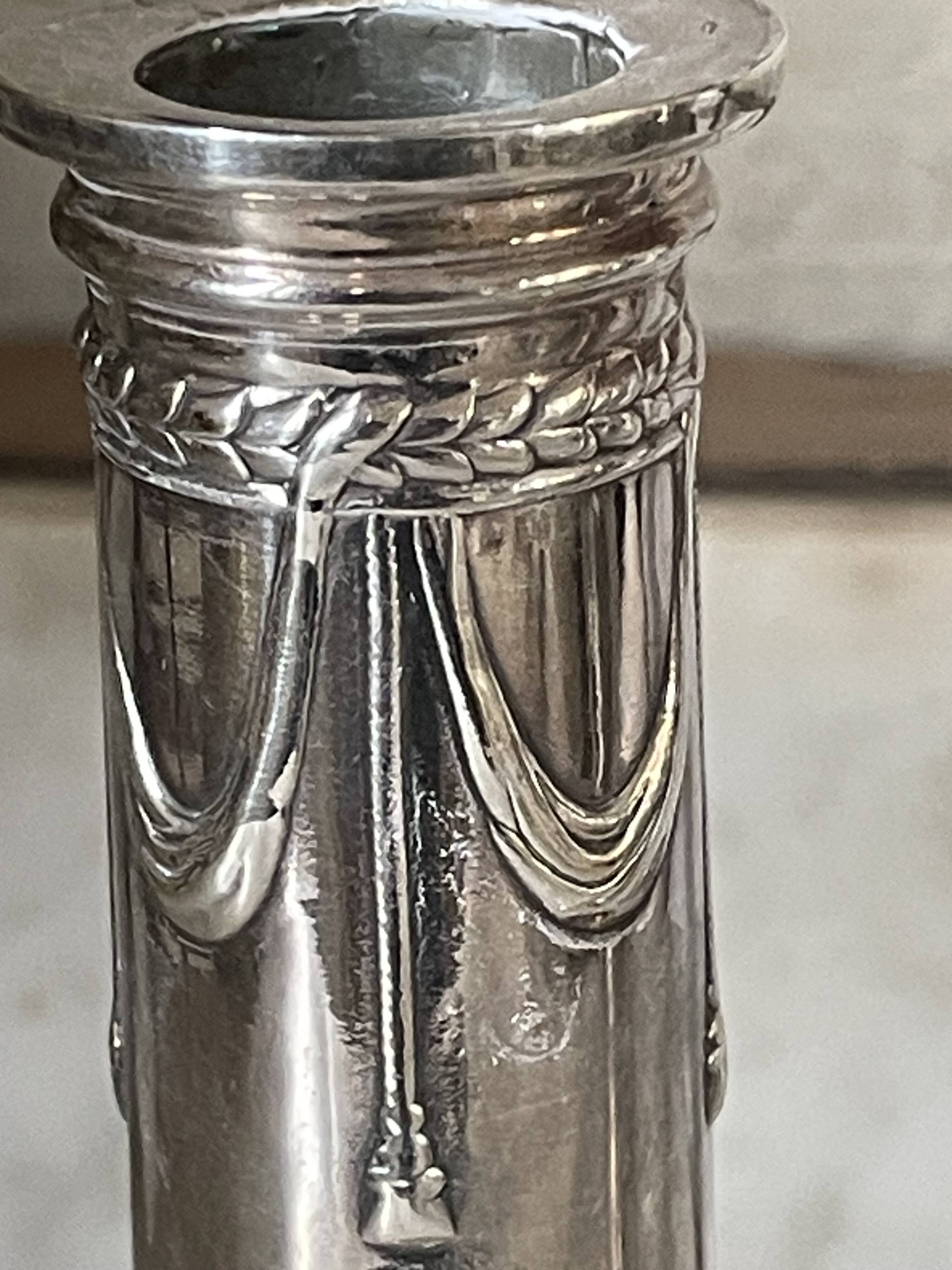 pair of Victorian style silver-plated candlesticks
