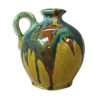 Yellow pitcher with green drips