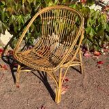 Pair of 1950s rattan armchairs from France.
