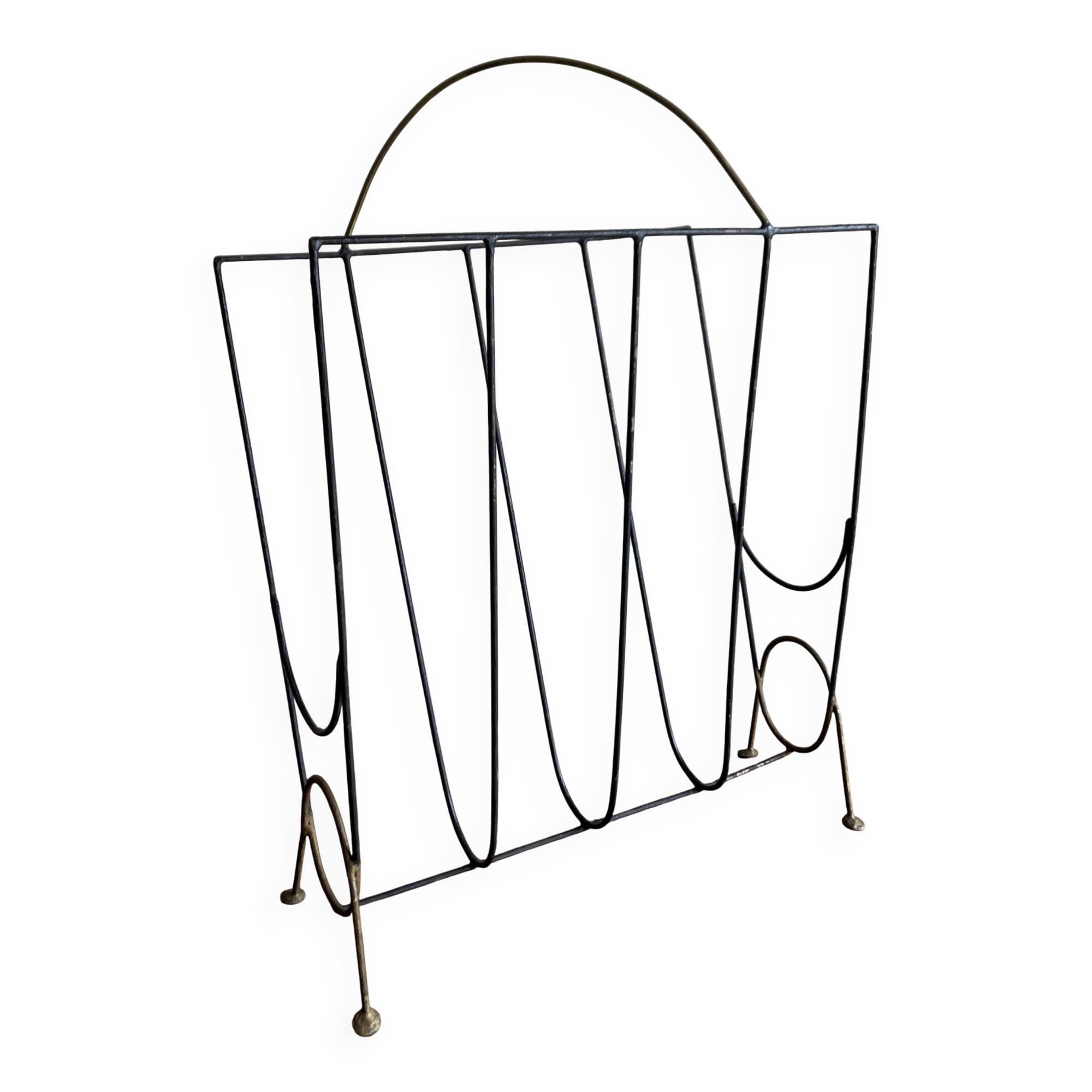 Mid-century poetic magazine rack in black metal