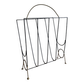 Mid-century poetic magazine rack in black metal