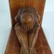 Vintage wooden bookends weeping Buddha