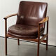 Leather and wood armchair by Ib Kofod Larsen