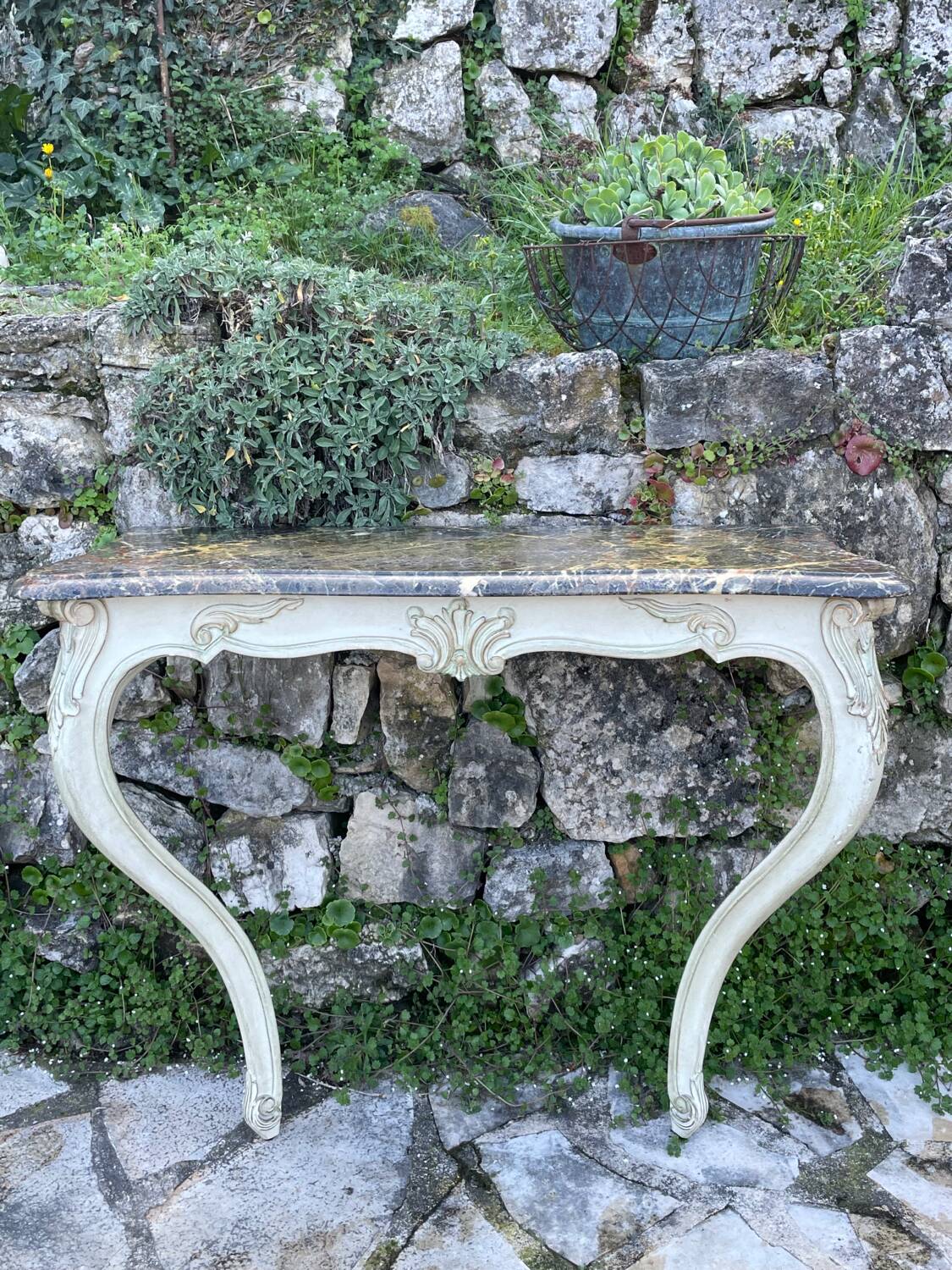 Wall console in painted, carved and molded wood in Louis XV style.