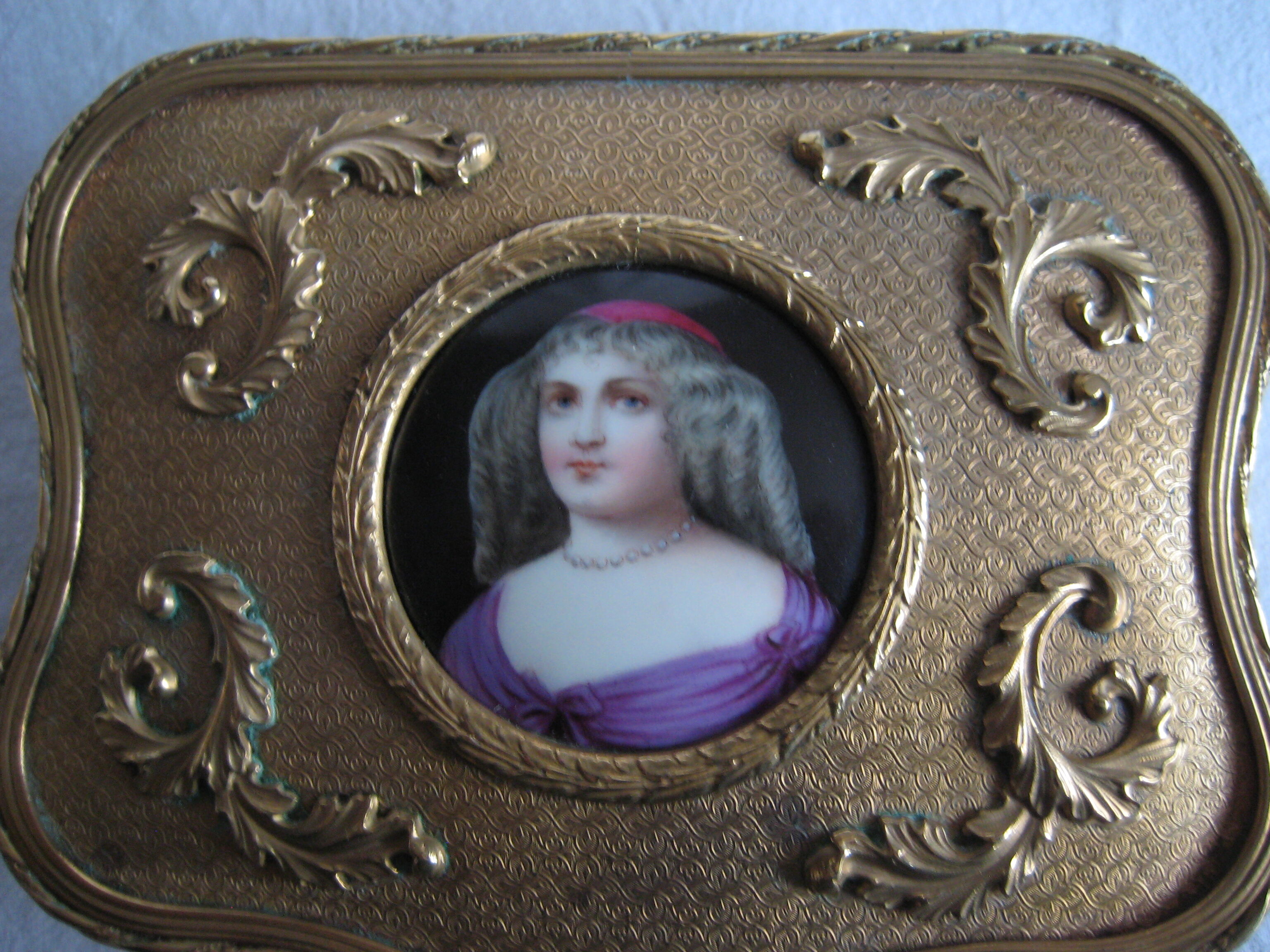 Brass jewelry box asked with porcelain betting