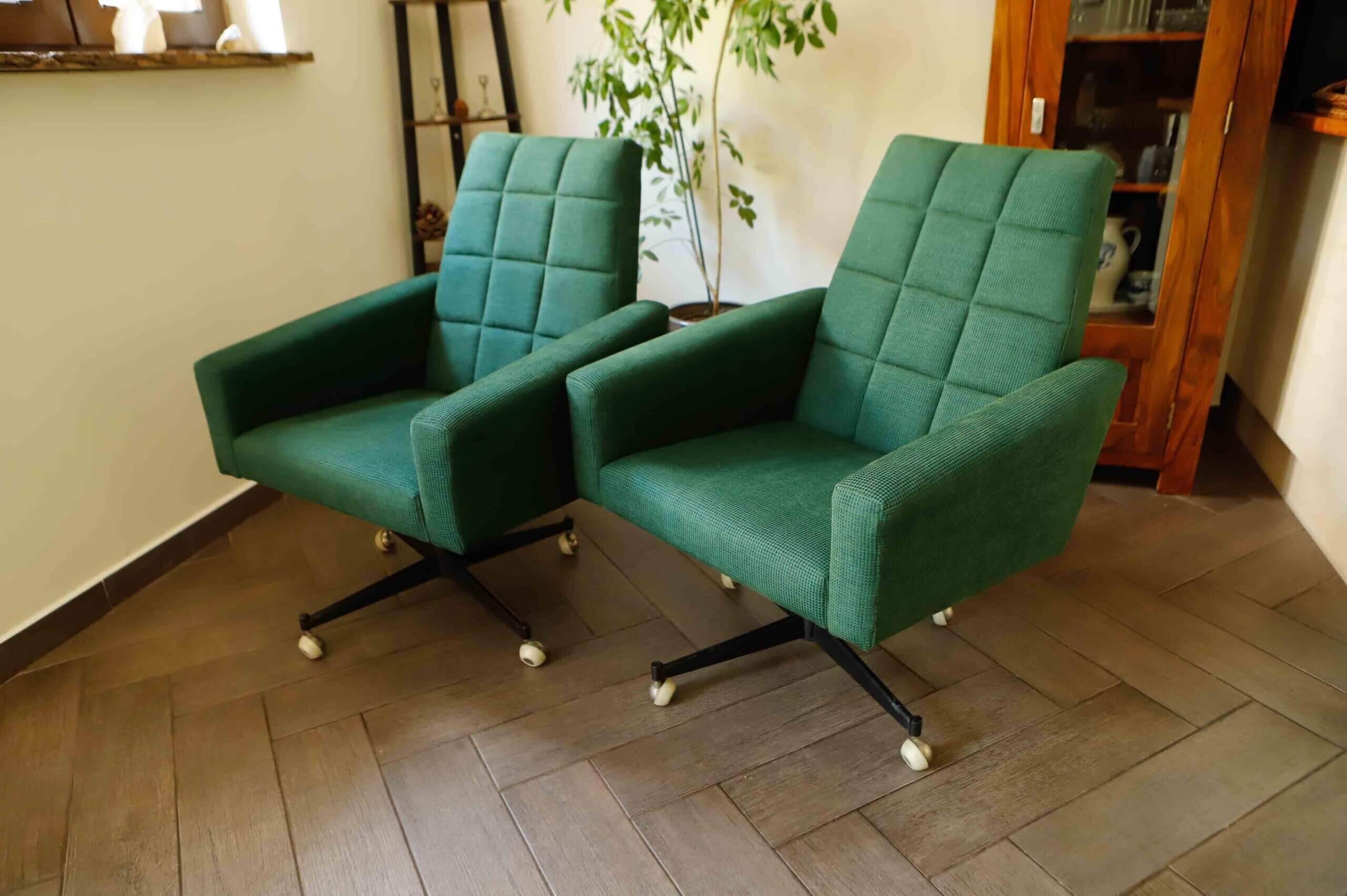 Pair of retro swivel chairs on casters