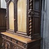 Two-body buffet in solid oak, richly carved in the Renaissance style.