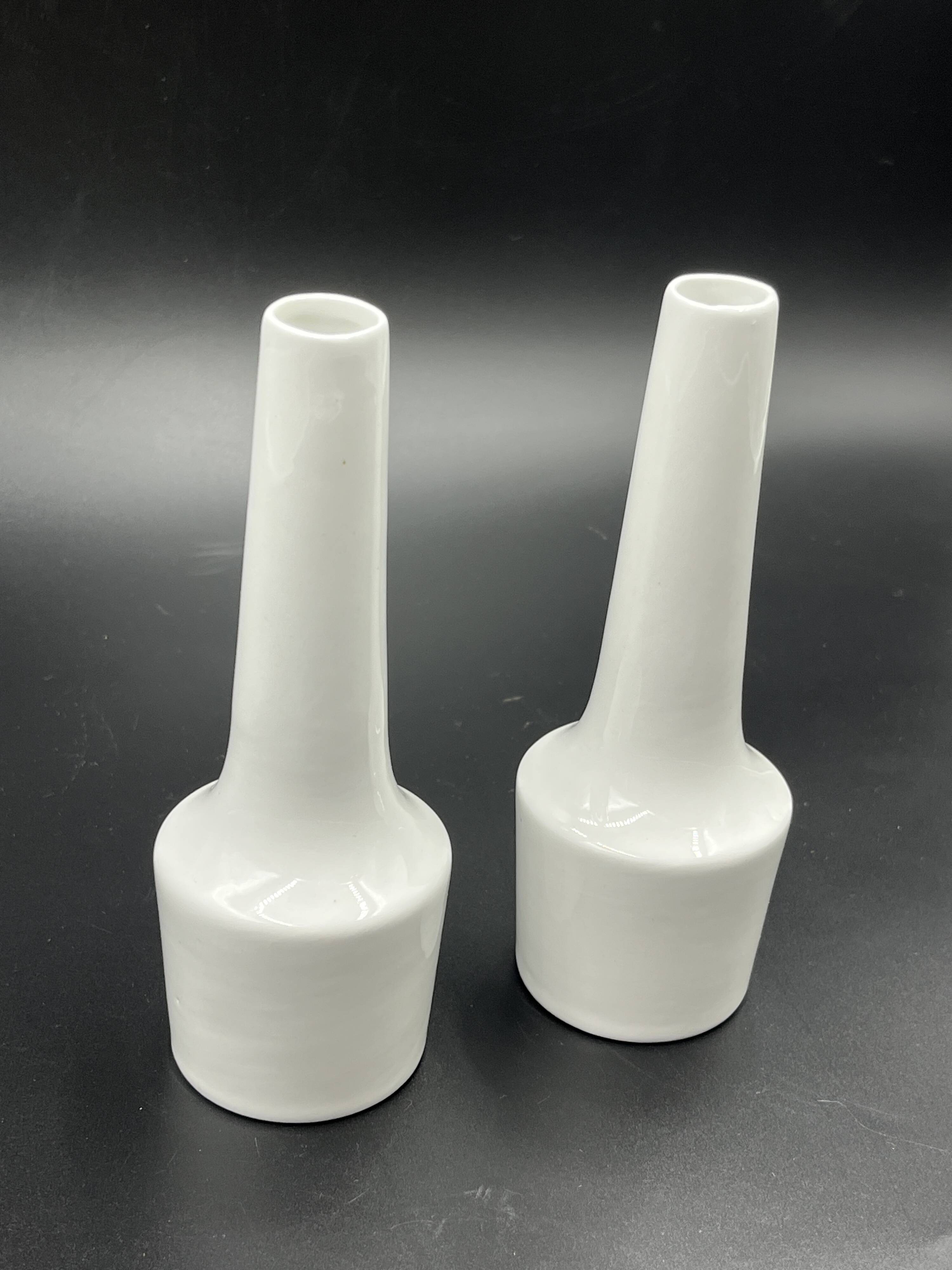 Pair of vintage white ceramic bud vases