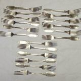 12 spoons and 18 table forks in sterling silver by E. Puiforcat
