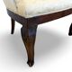 An antique Italian bar chair and a matching tufted vanity stool.