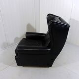 Black leather wingback chair on wheels 1960’s