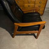 Scandinavian armchair and footrest in teak and leather 1960