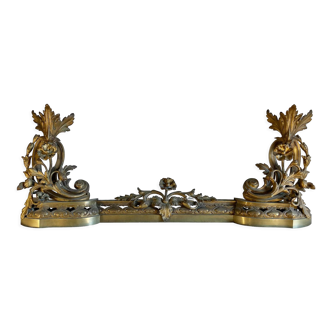 Barre de chenets de style Louis XV en bronze extensible