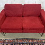 Canapé moderne en tissu et piètement chromé