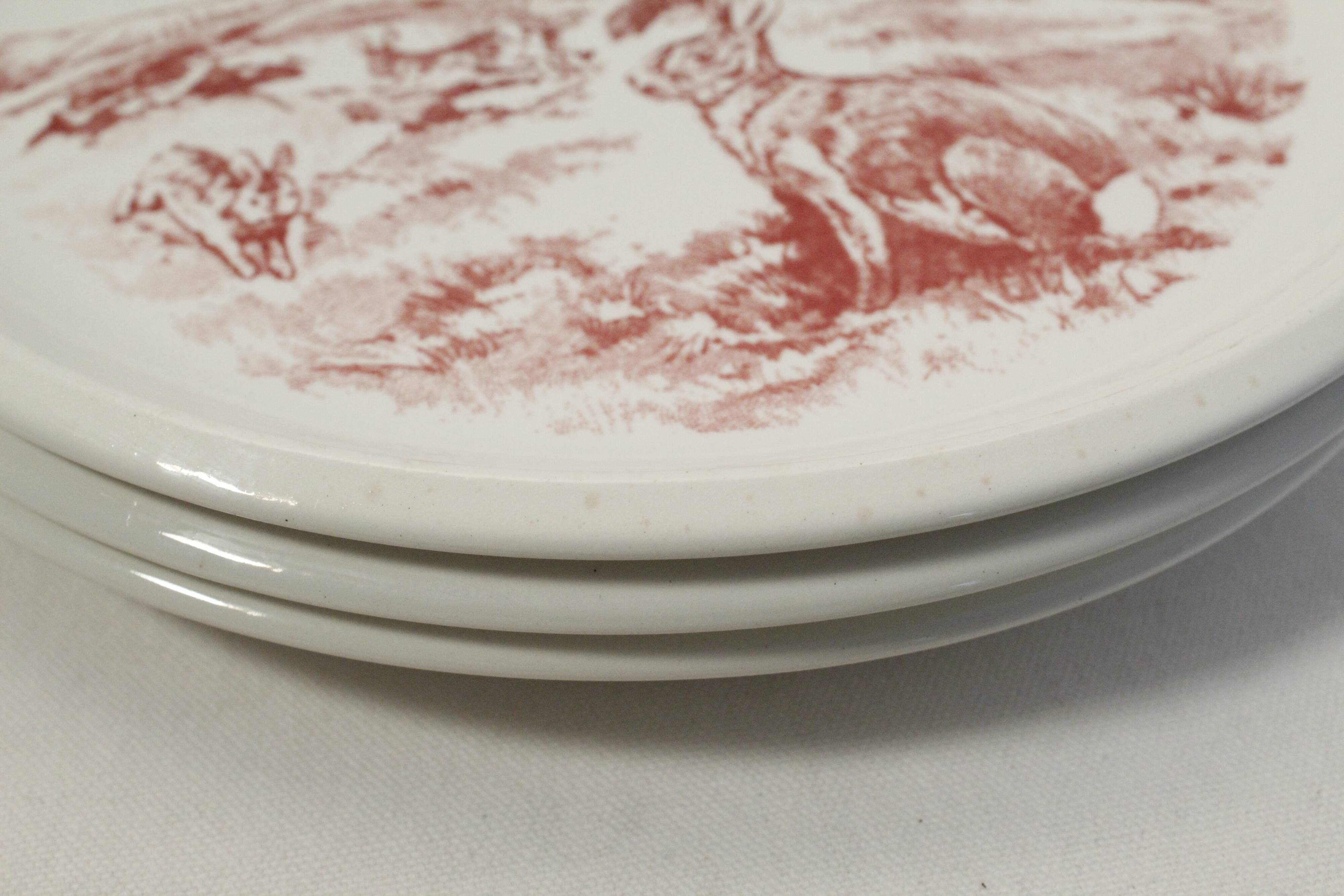 Set of 3 mismatched flat plates - red/burgundy decorations - deer and hare