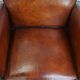 Vintage set of 4 sheepskin leather dining chairs on castors