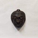 Ancient Indonesian bronze mask antique ethnic decoration tribal theater