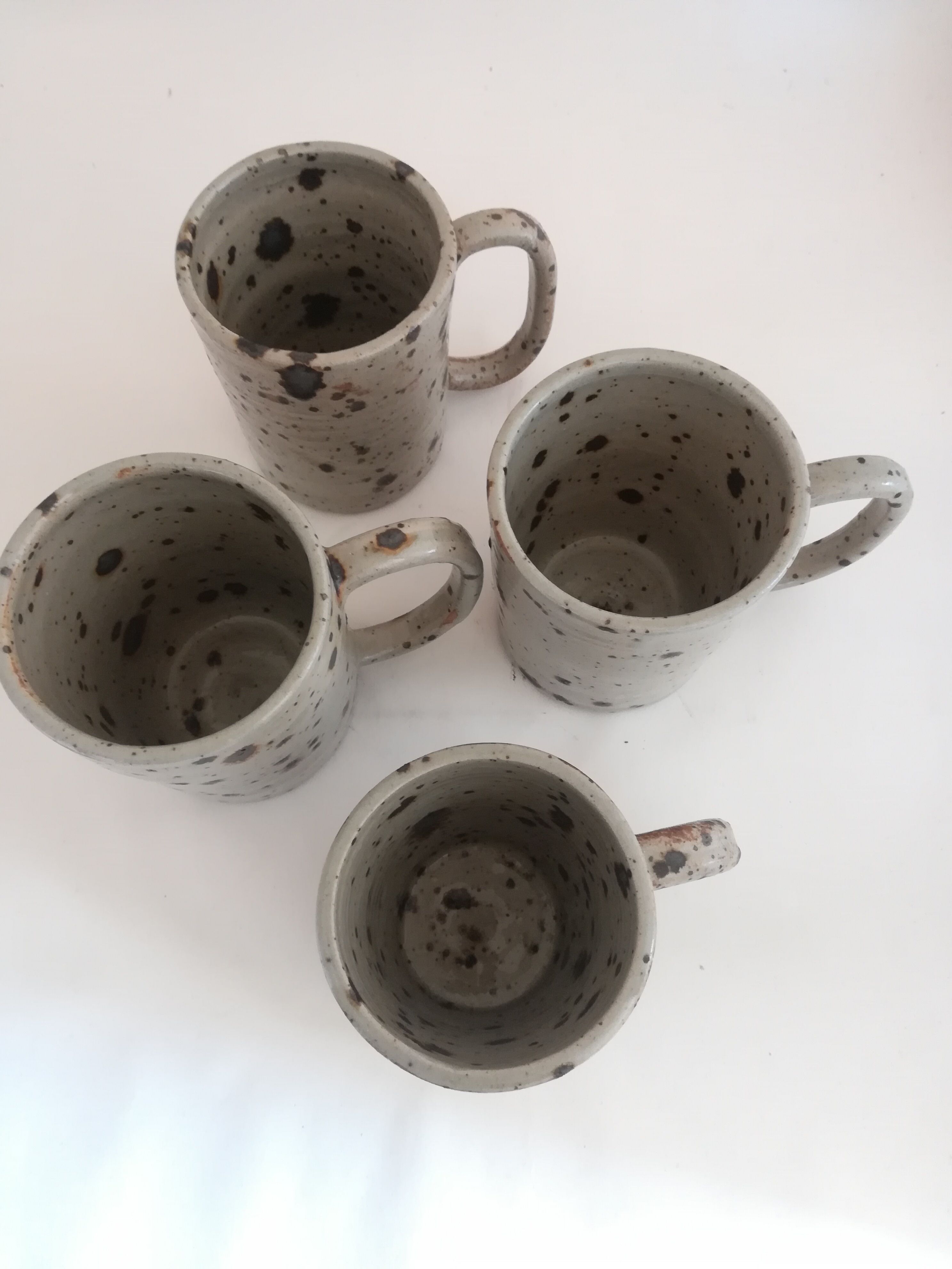 Set of four terracotta mugs