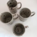 Set of four terracotta mugs