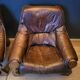 Pair of Vintage Brutalist armchairs from the 60s in leather and solid oak