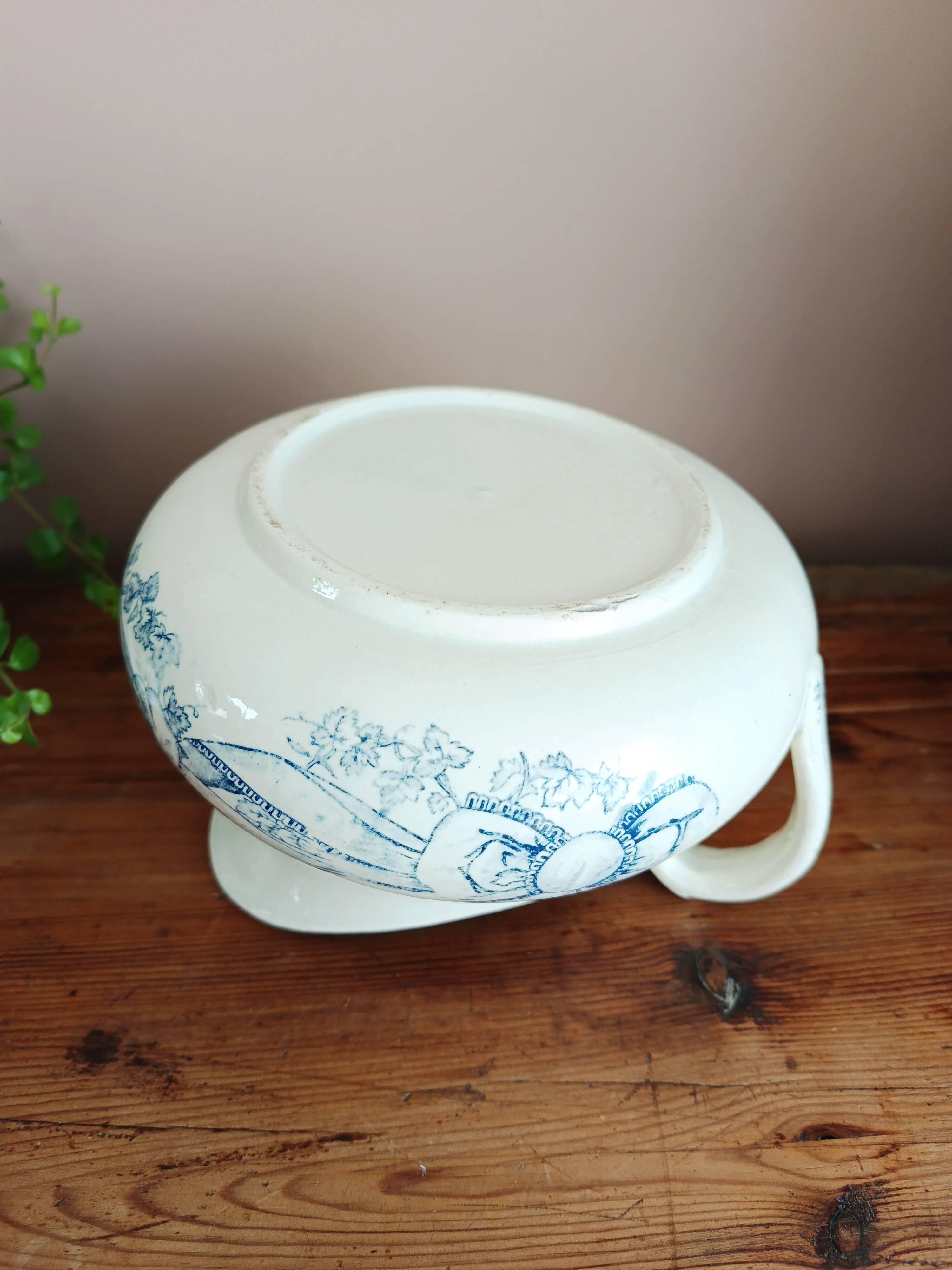 Old bulbous jug in ironstone earthenware
