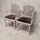 Paire de fauteuils cannés de style régence - bois peint - 19ème