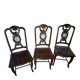 Sculpted chairs in solid wood