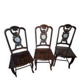 Sculpted chairs in solid wood