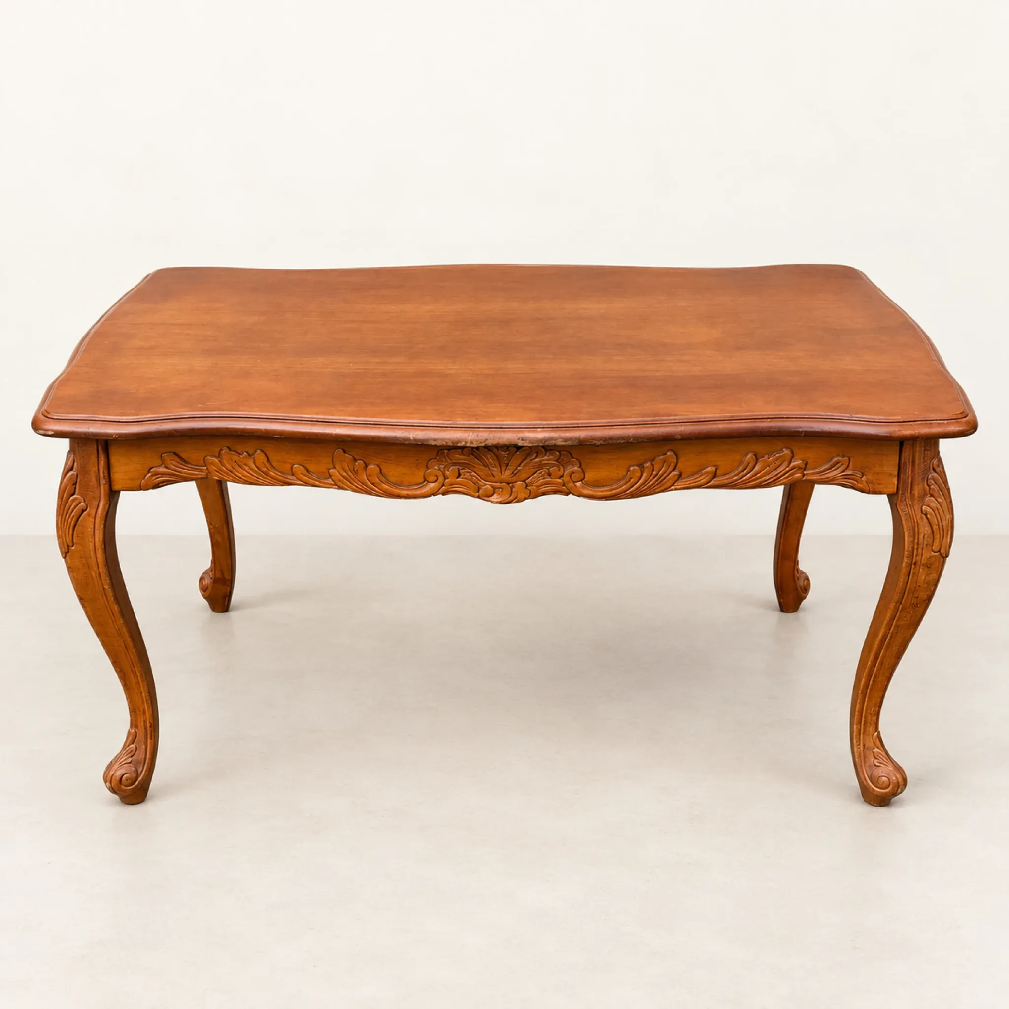 Louis XV coffee table in carved walnut