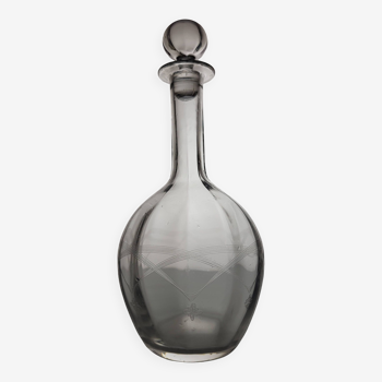 Glass carafe with engraved decoration