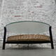 Vintage coffee table with glass top and rattan basket