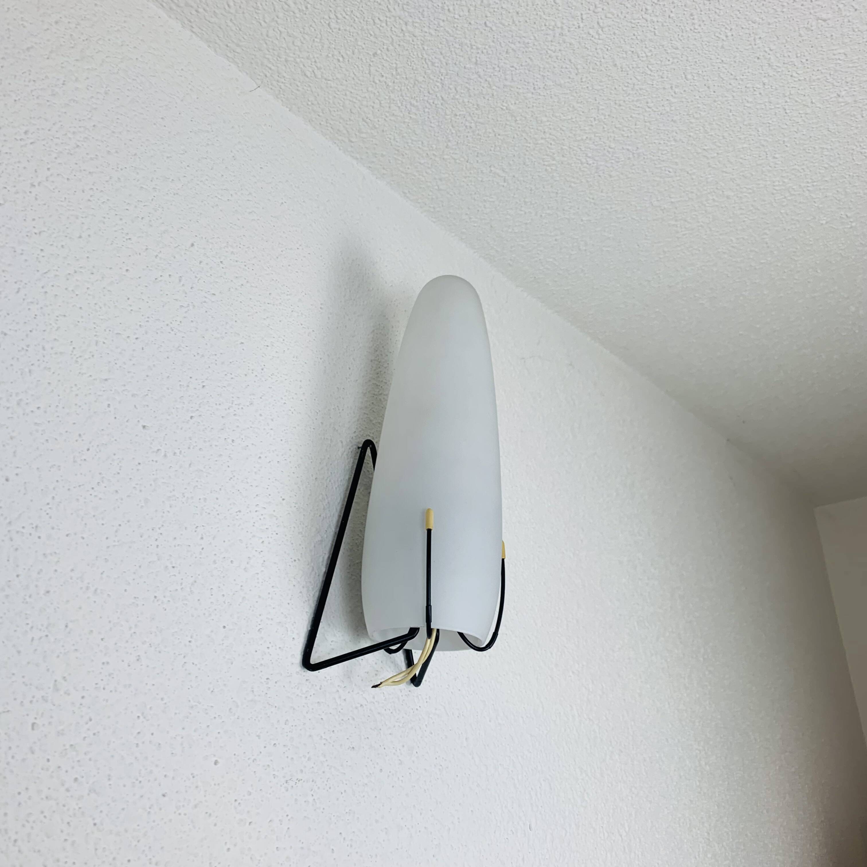 Louis Kalff wall lamp from the 50s, opaline