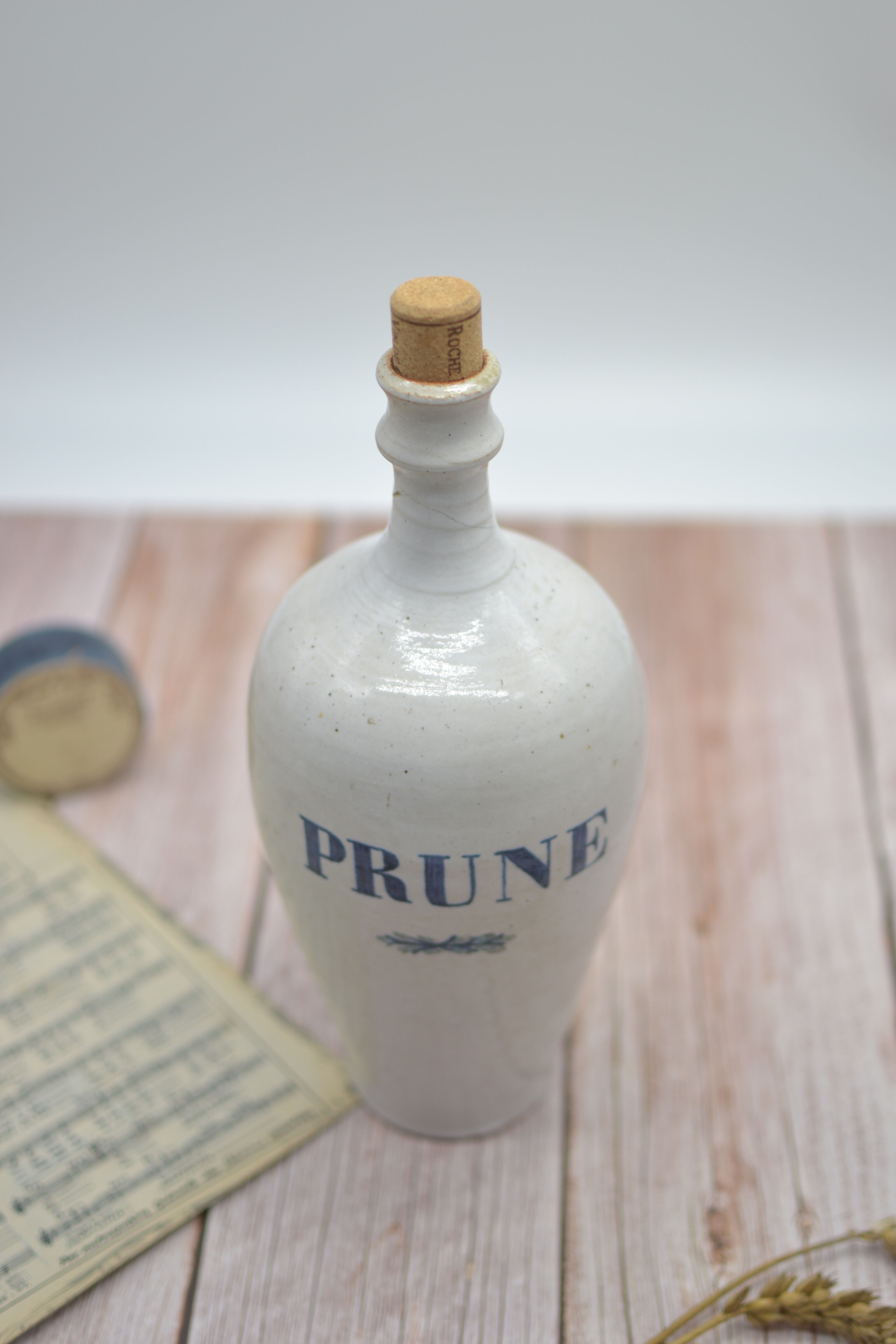 Vintage plum stoneware bottle
