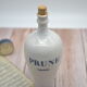 Vintage stoneware bottle in plum