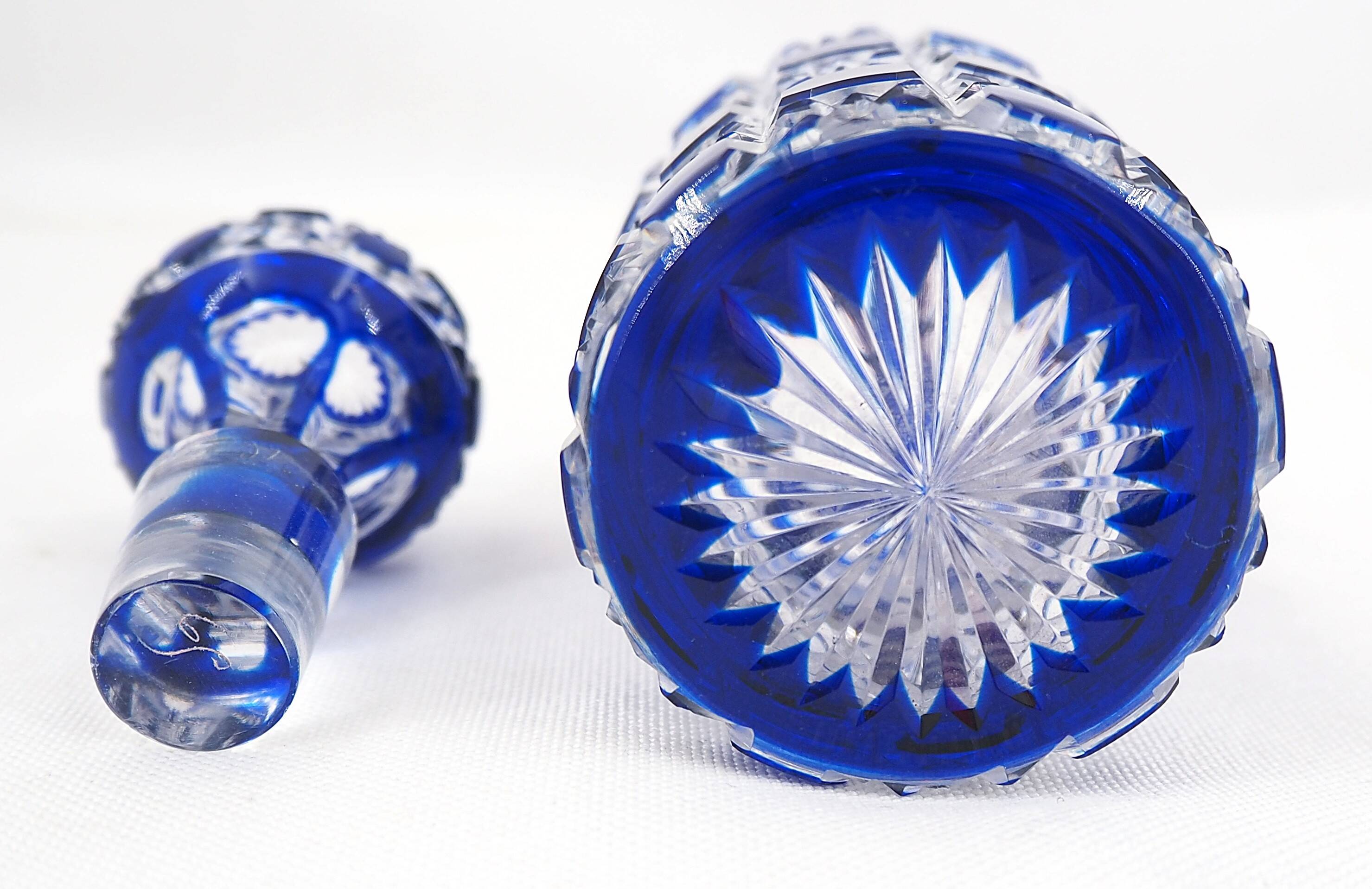 Baccarat, cut crystal bottle, blue lined, diamond gemstones, 14.8 cm.