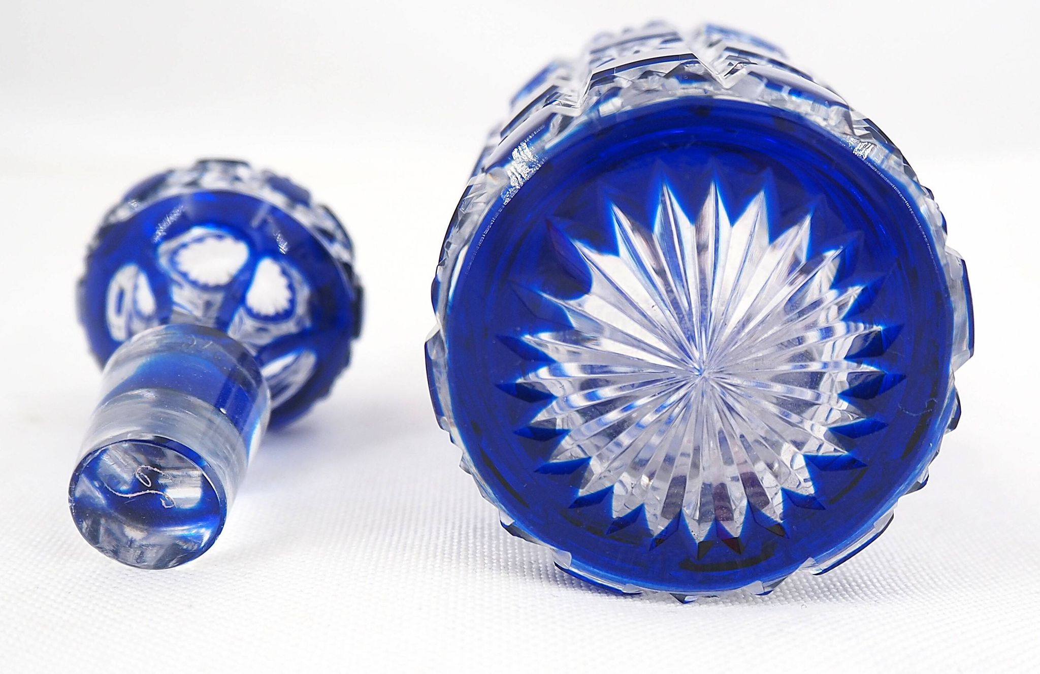 Baccarat, cut crystal bottle, blue lined, diamond gemstones, 14.8 cm.