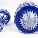 Baccarat, cut crystal bottle, blue lined, diamond gemstones, 14.8 cm.