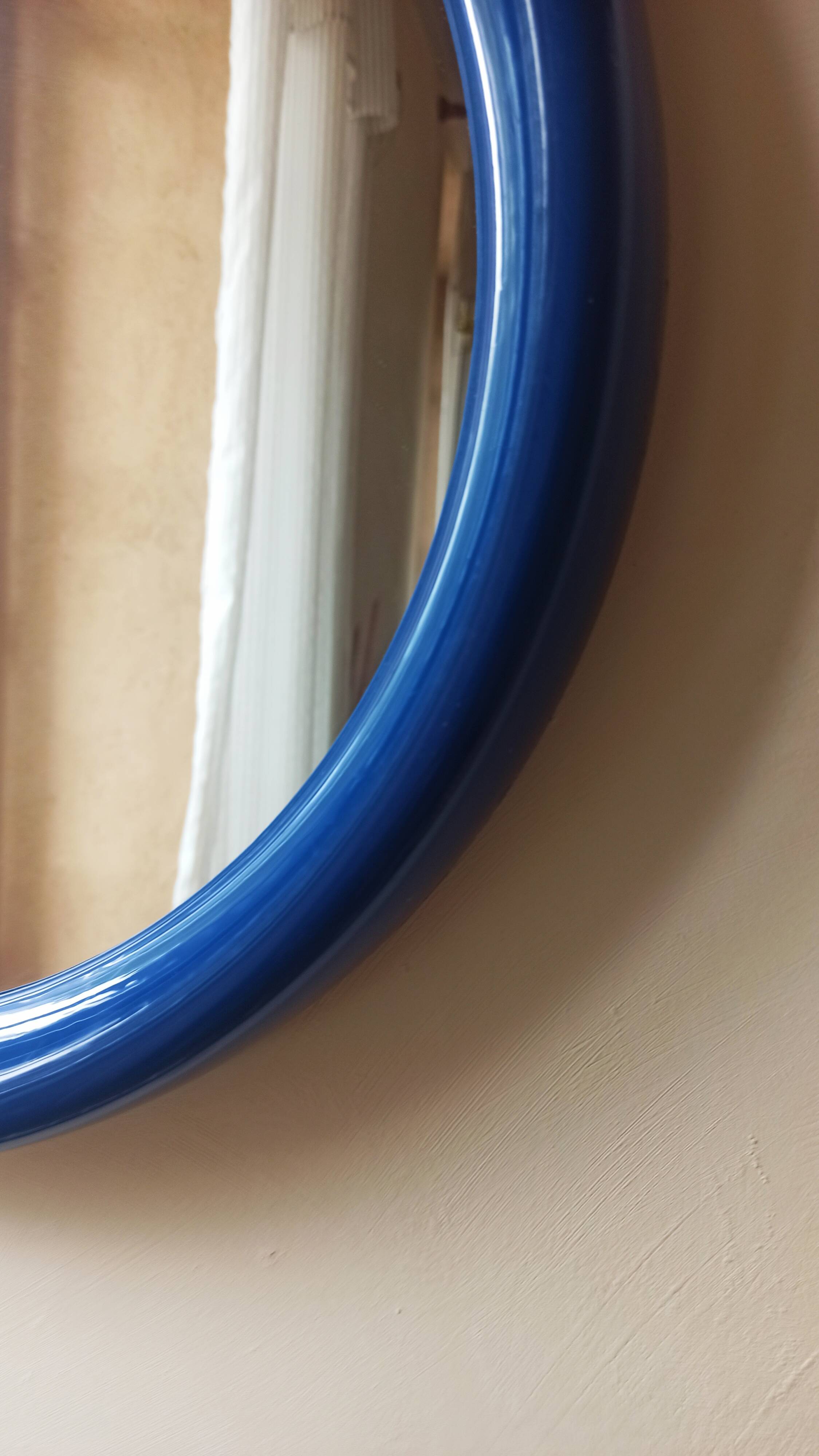 Royal blue round mirror space age